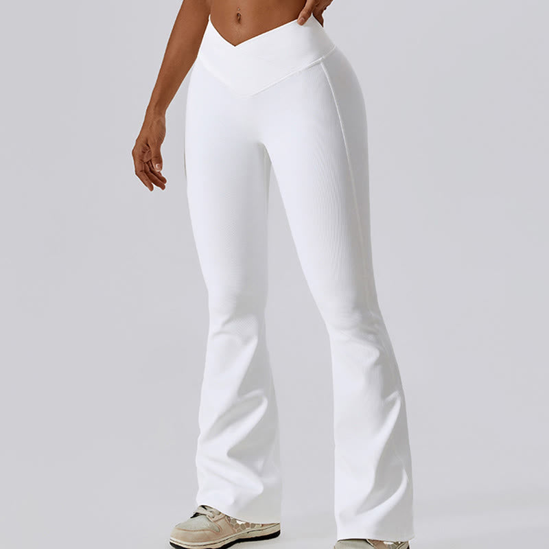 Top corto sin mangas con Buddha Stones y pantalones acampanados para deportes, fitness y yoga