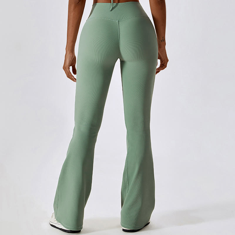 Top corto sin mangas con Buddha Stones y pantalones acampanados para deportes, fitness y yoga