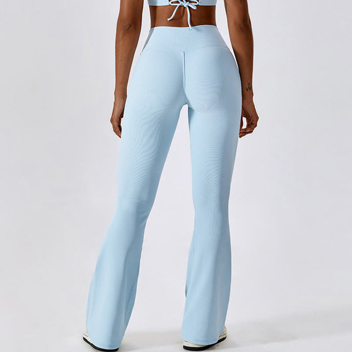 Top corto sin mangas con Buddha Stones y pantalones acampanados para deportes, fitness y yoga