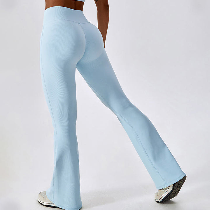 Top corto sin mangas con Buddha Stones y pantalones acampanados para deportes, fitness y yoga