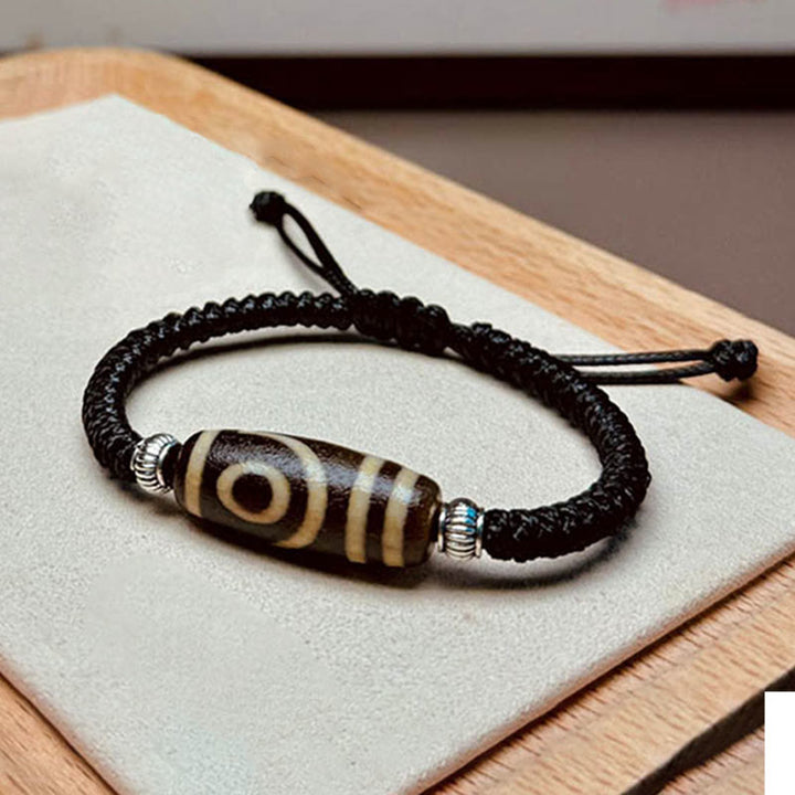 Buddha Stones Pulsera Tibetana con Cuentas Dzi de Nueve Ojos y de Tres Ojos para Protección y Riqueza