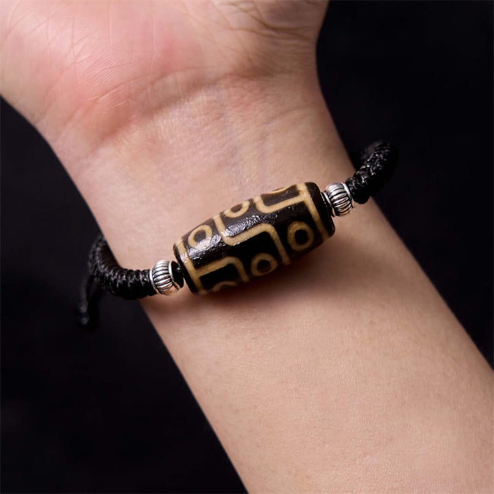 Buddha Stones Pulsera Tibetana con Cuentas Dzi de Nueve Ojos y de Tres Ojos para Protección y Riqueza