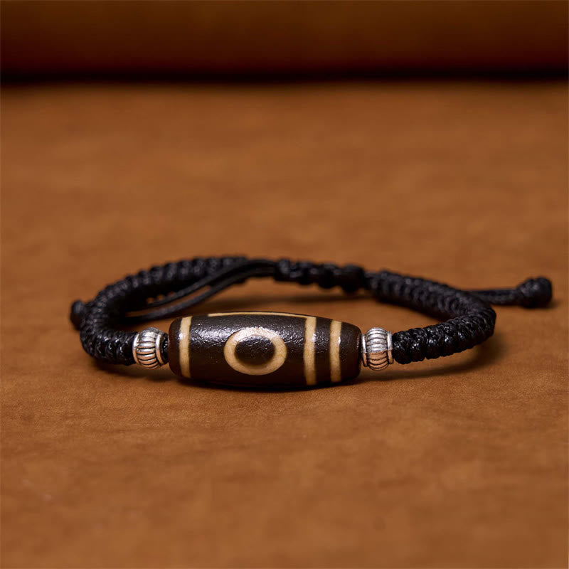 Buddha Stones Pulsera Tibetana con Cuentas Dzi de Nueve Ojos y de Tres Ojos para Protección y Riqueza