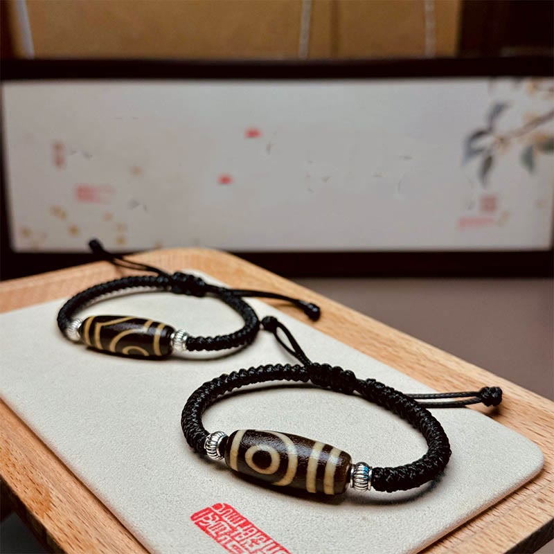 Buddha Stones Pulsera Tibetana con Cuentas Dzi de Nueve Ojos y de Tres Ojos para Protección y Riqueza