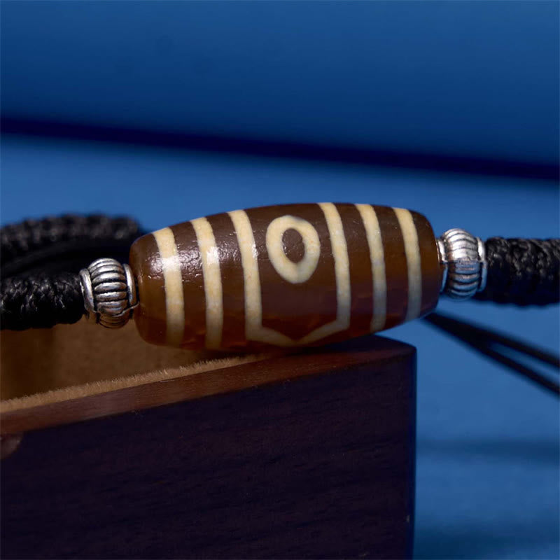 Buddha Stones Pulsera Tibetana con Cuentas Dzi de Nueve Ojos y de Tres Ojos para Protección y Riqueza