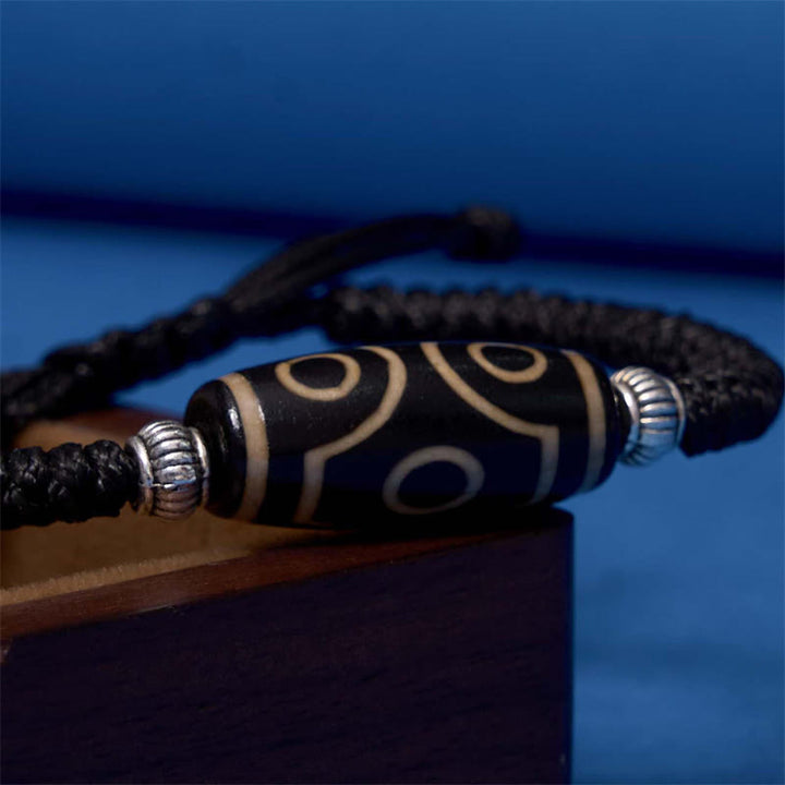 Buddha Stones Pulsera Tibetana con Cuentas Dzi de Nueve Ojos y de Tres Ojos para Protección y Riqueza