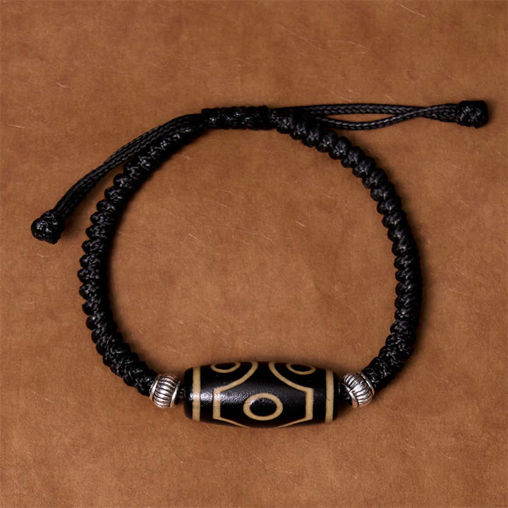 Buddha Stones Pulsera Tibetana con Cuentas Dzi de Nueve Ojos y de Tres Ojos para Protección y Riqueza