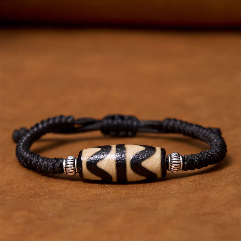 Buddha Stones Pulsera Tibetana con Cuentas Dzi de Nueve Ojos y de Tres Ojos para Protección y Riqueza