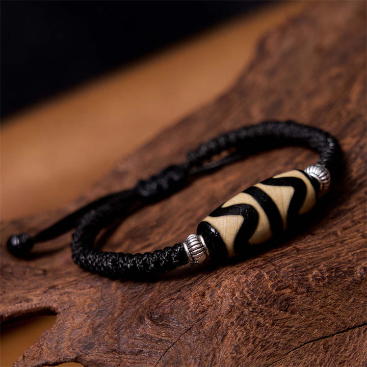 Buddha Stones Pulsera Tibetana con Cuentas Dzi de Nueve Ojos y de Tres Ojos para Protección y Riqueza