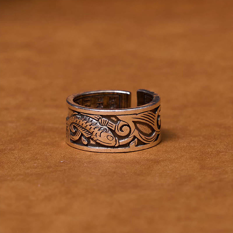 Anillo de la suerte y la riqueza con diseño tallado de Koi Fish del Sutra del Corazón de Buddha Stones