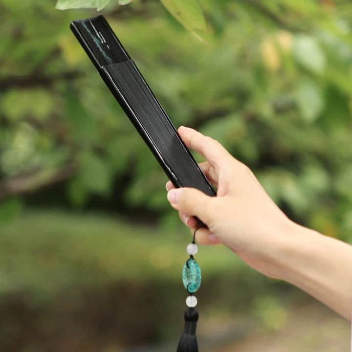 Abanico plegable de bambú de mano con diseño de grulla de río y montaña retro con Buddha Stones