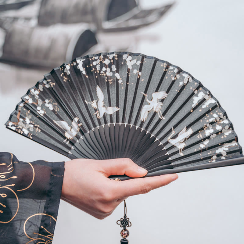 Abanico plegable de bambú de mano con grullas de flores de ciruelo y Buddha Stones