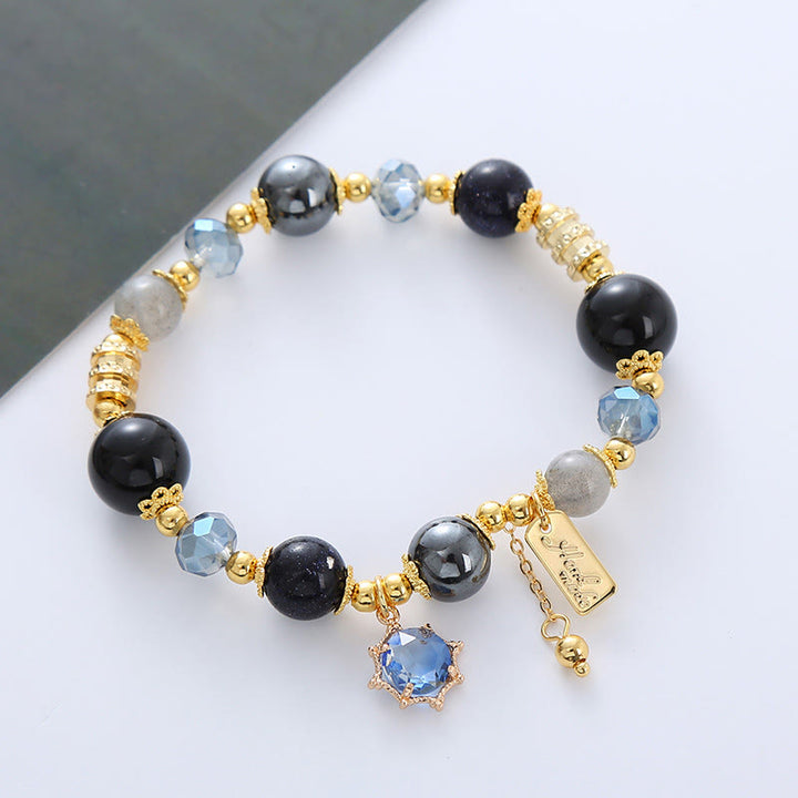 Pulsera de fuerza de piedra arenisca azul, hematita y obsidiana negra natural de Buddha Stones