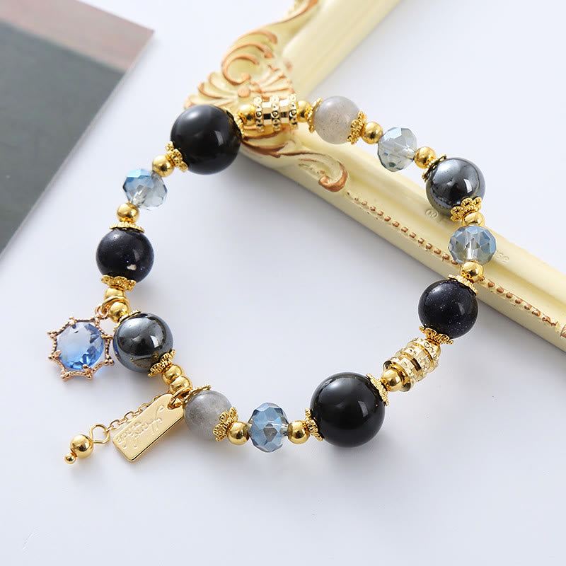 Pulsera de fuerza de piedra arenisca azul, hematita y obsidiana negra natural de Buddha Stones