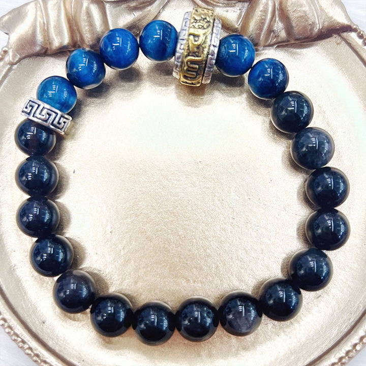 Pulsera protectora de obsidiana azul con ojo de tigre y Buddha Stones con brillo plateado