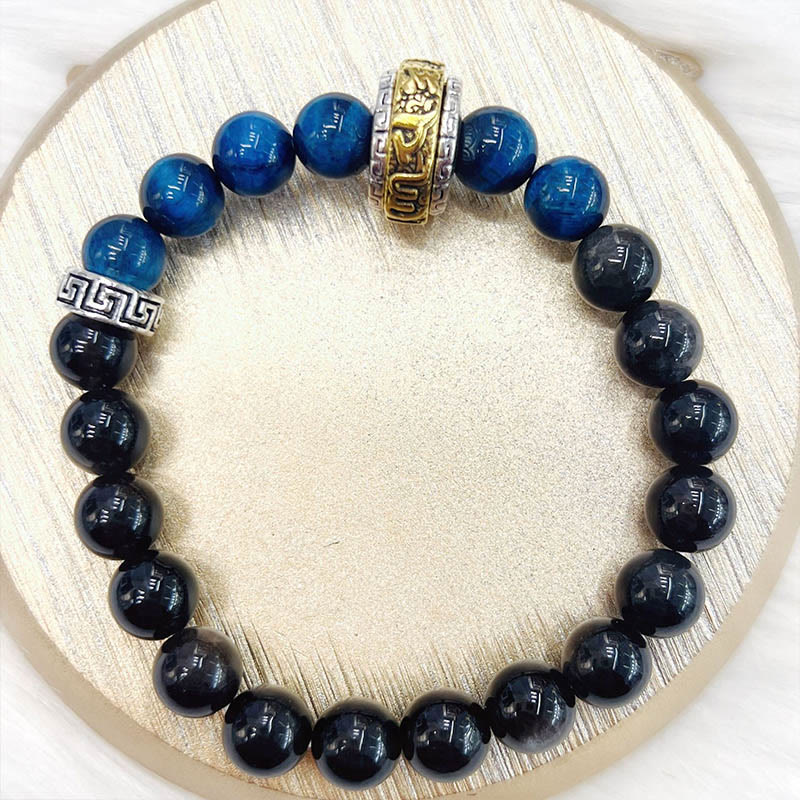 Pulsera protectora de obsidiana azul con ojo de tigre y Buddha Stones con brillo plateado
