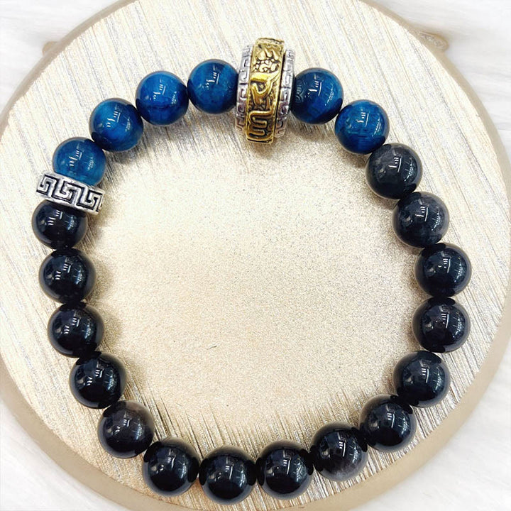 Pulsera protectora de obsidiana azul con ojo de tigre y Buddha Stones con brillo plateado