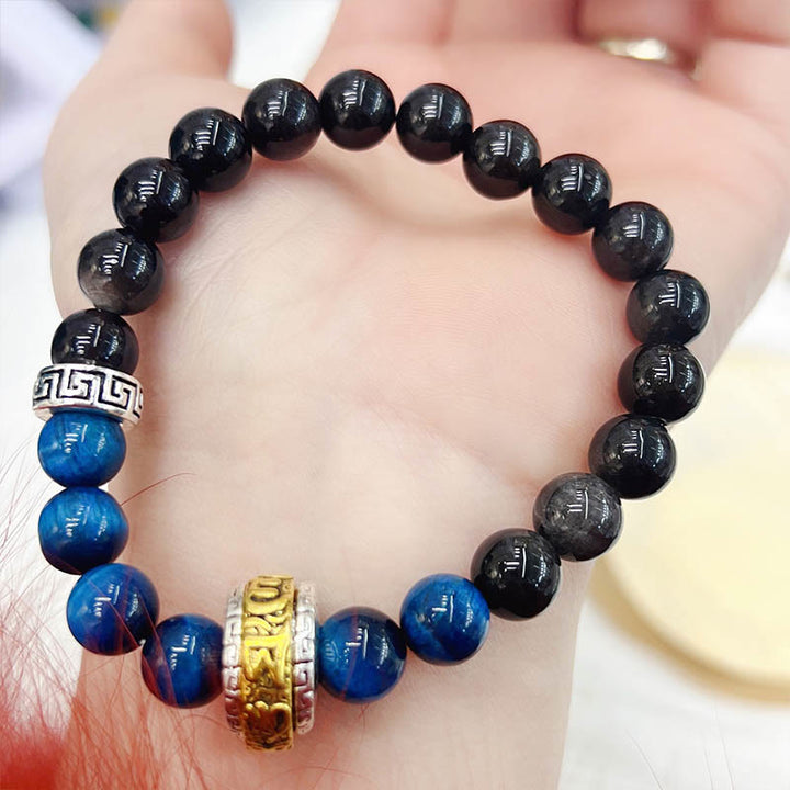 Pulsera protectora de obsidiana azul con ojo de tigre y Buddha Stones con brillo plateado
