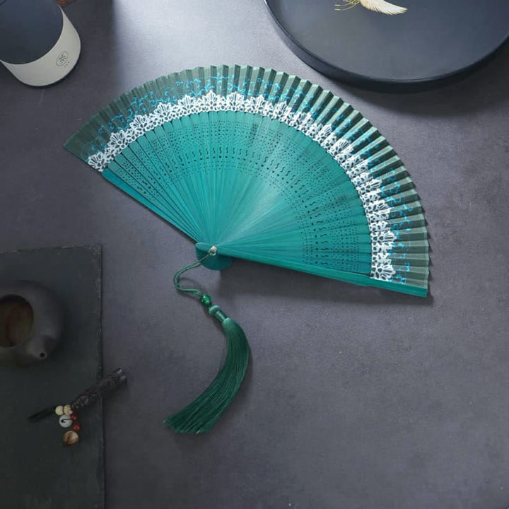 Abanico plegable de bambú con borlas de poliéster y Buddha Stones, 21 cm