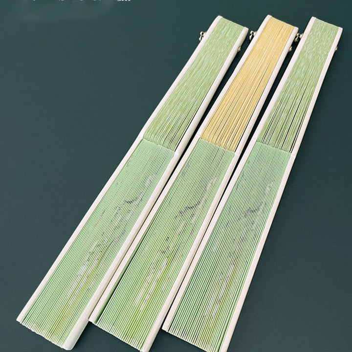 Abanico plegable de bambú con flores de begonia, orquídea y Buddha Stones