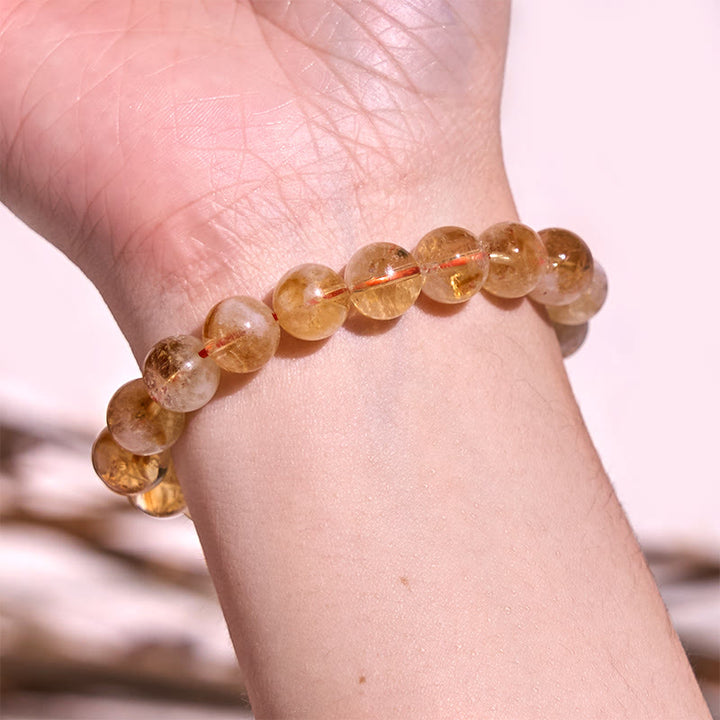 Pulsera positiva de felicidad de la serie amarilla con Buddha Stones que aumentan la confianza