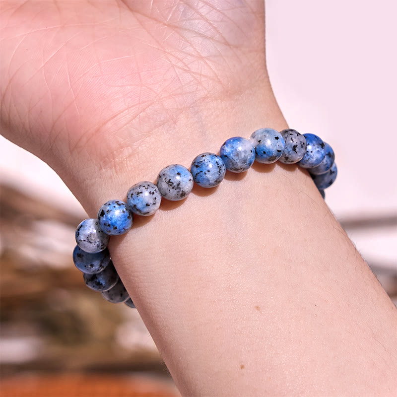 Pulsera de tranquilidad y calma de la serie azul Let The Past Go de Buddha Stones