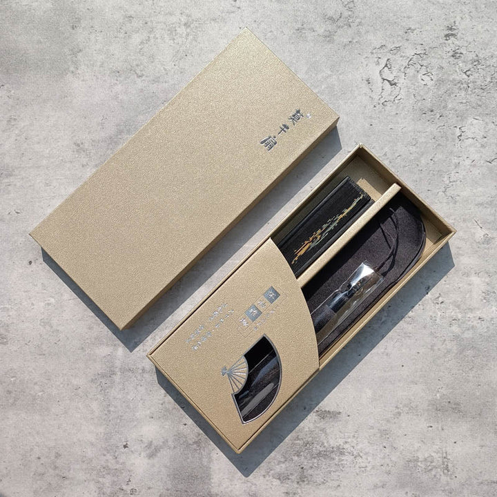 Abanico plegable de bambú de mano con estampado de hojas de bambú negro y Buddha Stones