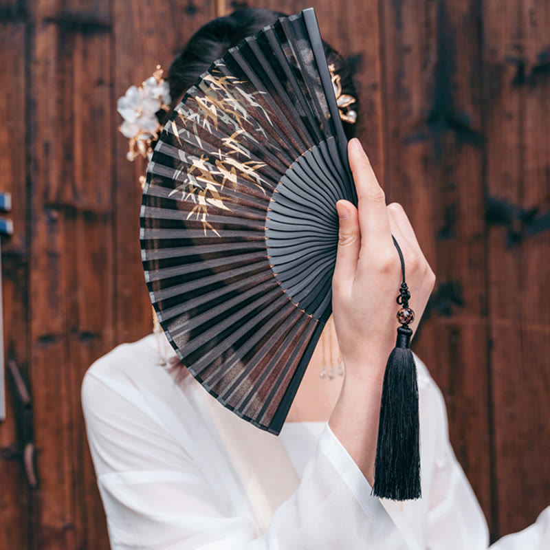 Abanico plegable de bambú de mano con estampado de hojas de bambú negro y Buddha Stones