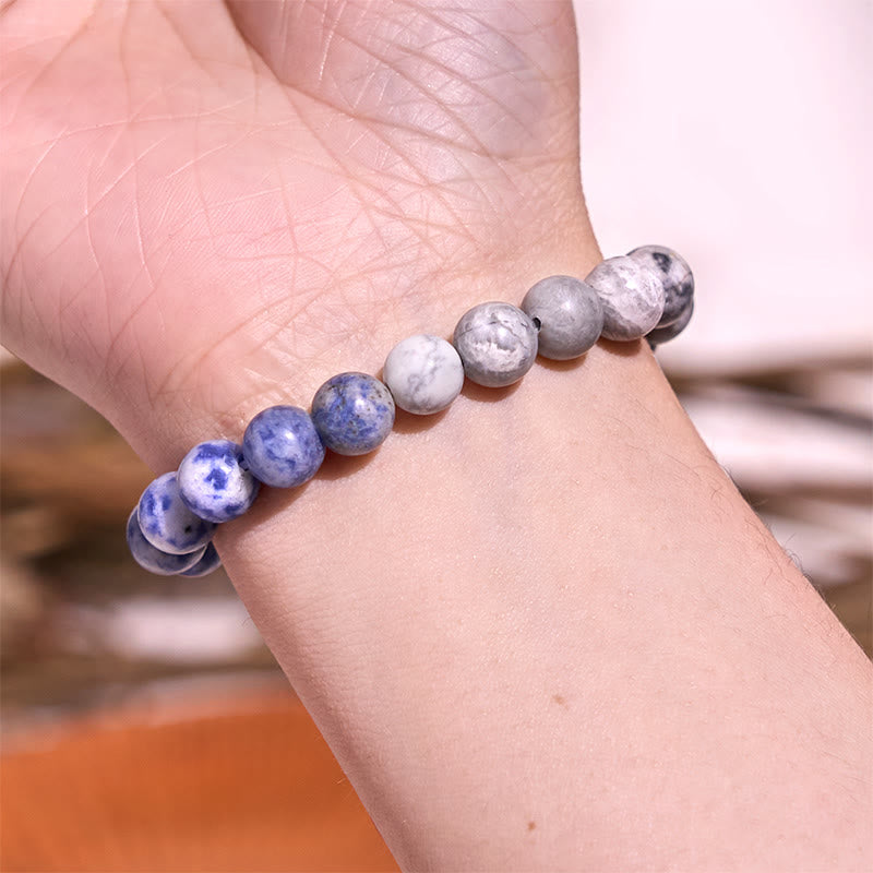 Pulsera de tranquilidad y amor con Buddha Stones que restauran la calma en colores fríos