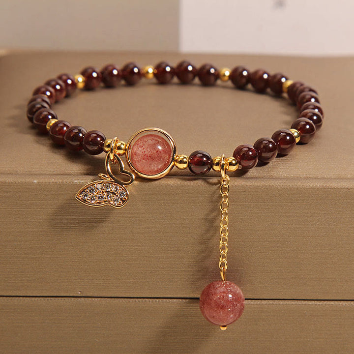 Pulsera de protección con forma de mariposa y cuarzo fresa y granate natural de Buddha Stones
