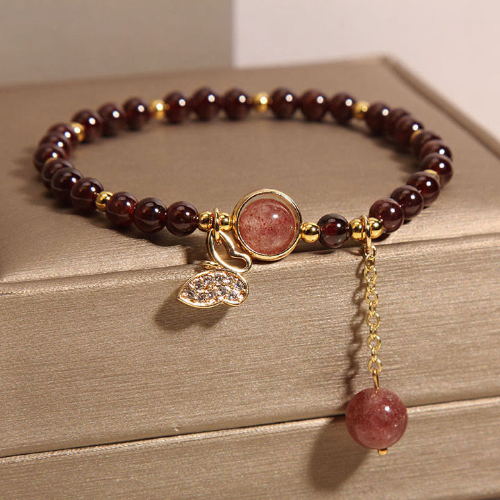 Pulsera de protección con forma de mariposa y cuarzo fresa y granate natural de Buddha Stones