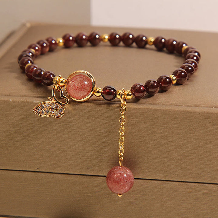 Pulsera de protección con forma de mariposa y cuarzo fresa y granate natural de Buddha Stones