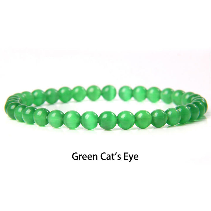 Pulsera protectora con cuentas de ojo de tigre rojo y Buddha Stones de 6 mm y cristales de varias piedras con purpurina negra