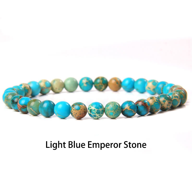 Pulsera protectora con cuentas de ojo de tigre rojo y Buddha Stones de 6 mm y cristales de varias piedras con purpurina negra