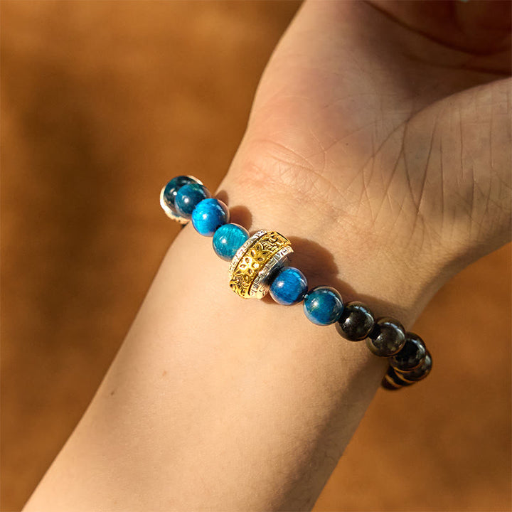 Pulsera protectora de obsidiana azul con ojo de tigre y Buddha Stones con brillo plateado