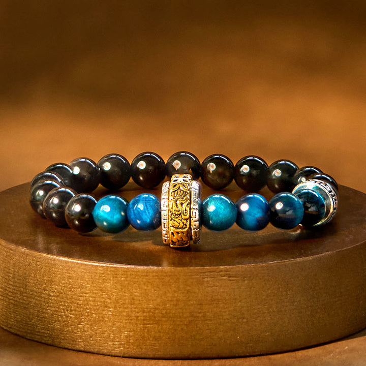 Pulsera protectora de obsidiana azul con ojo de tigre y Buddha Stones con brillo plateado