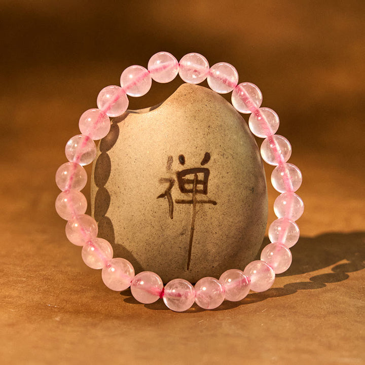 Pulsera de energía curativa de cuarzo rosa con Buddha Stones