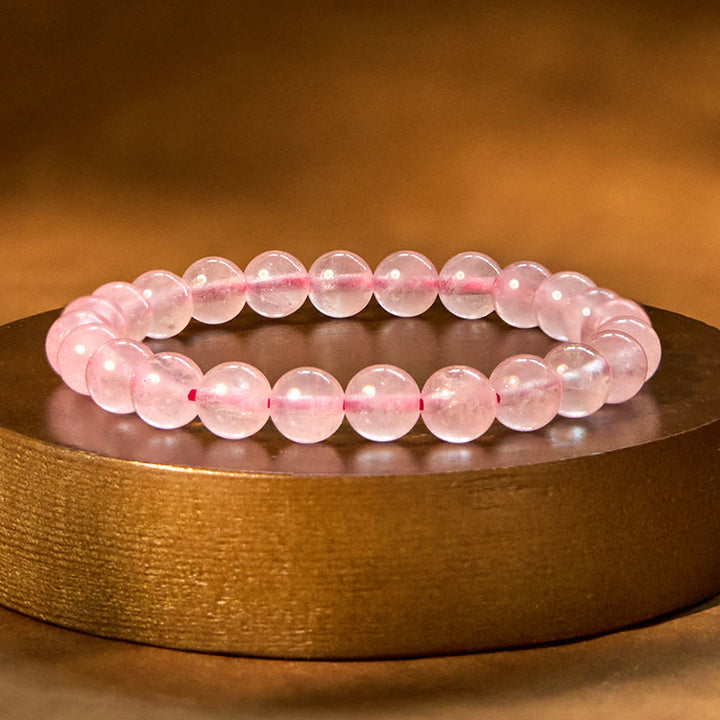 Pulsera de energía curativa de cuarzo rosa con Buddha Stones