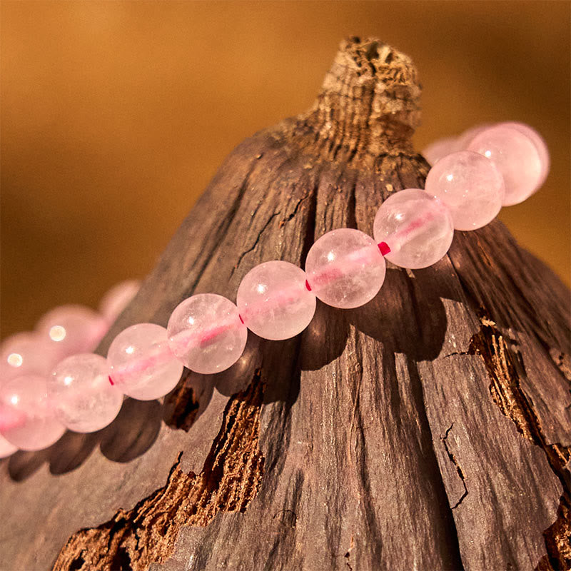 Pulsera de energía curativa de cuarzo rosa con Buddha Stones