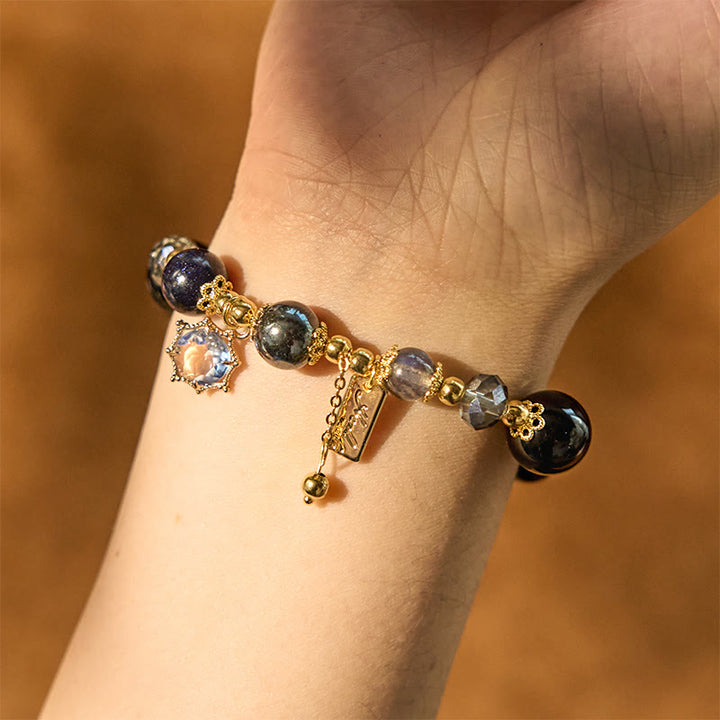 Pulsera de fuerza de piedra arenisca azul, hematita y obsidiana negra natural de Buddha Stones