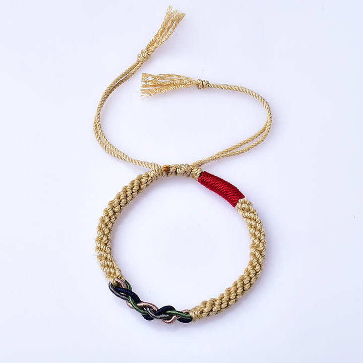 Pulsera de la suerte con cuerda de algodón frotada a mano tibetana con Buddha Stones
