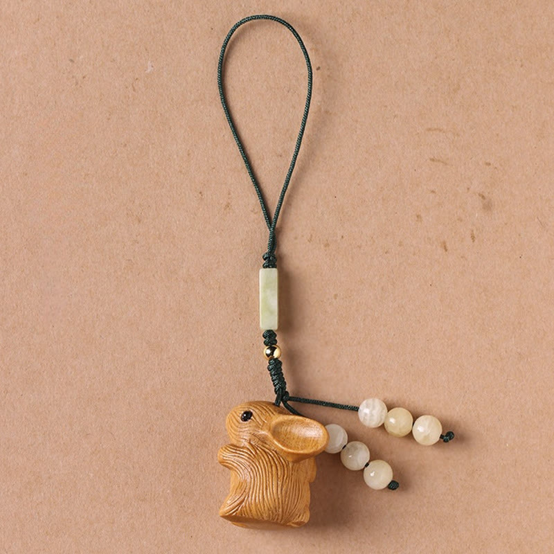Llavero con colgante para teléfono, diseño de conejo de la suerte, con forma de sándalo rojo, con forma de hoja pequeña y piedras de Buddha Stones.