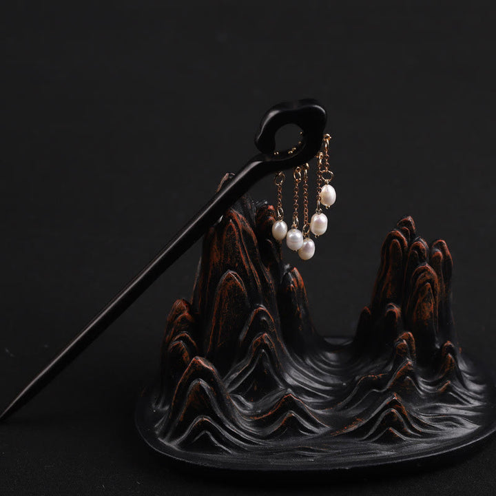 Horquilla protectora con borla de perla de nube auspiciosa de ébano y Buddha Stones