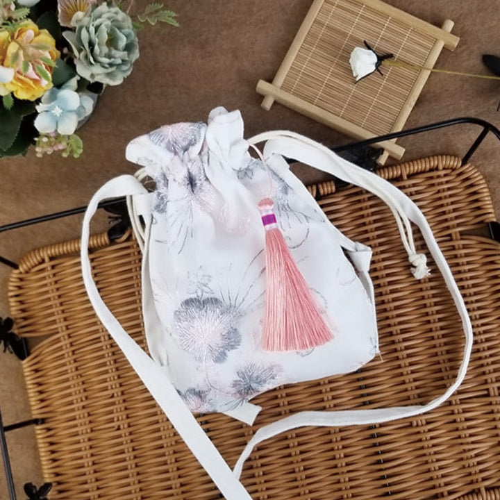 Bolso bandolera de lona con Buddha Stones , flores bordadas y flores de cerezo enredaderas.