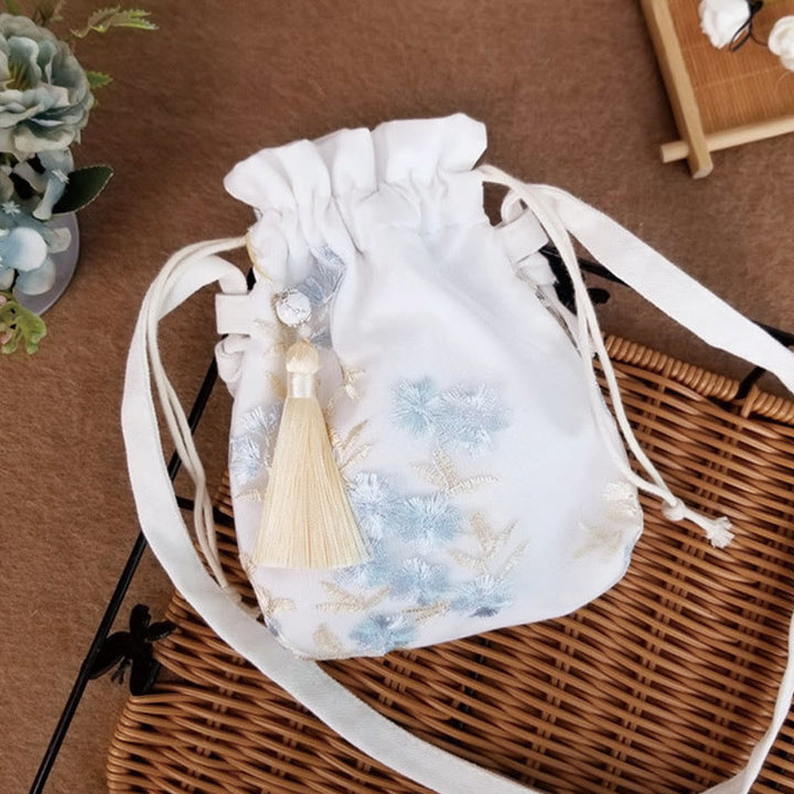 Bolso bandolera de lona con Buddha Stones , flores bordadas y flores de cerezo enredaderas.