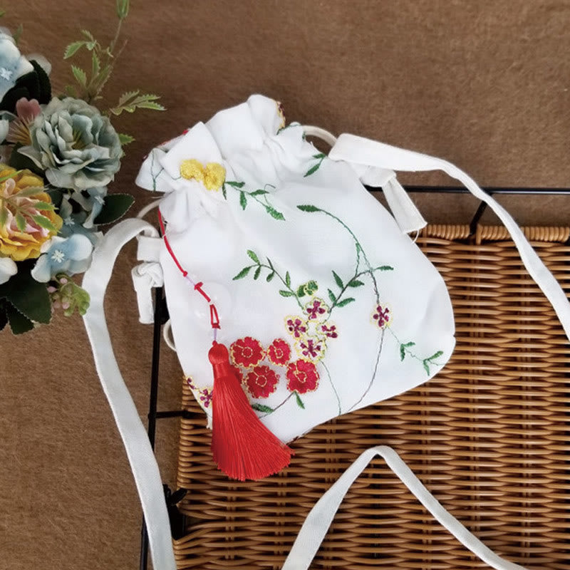 Bolso bandolera de lona con Buddha Stones , flores bordadas y flores de cerezo enredaderas.