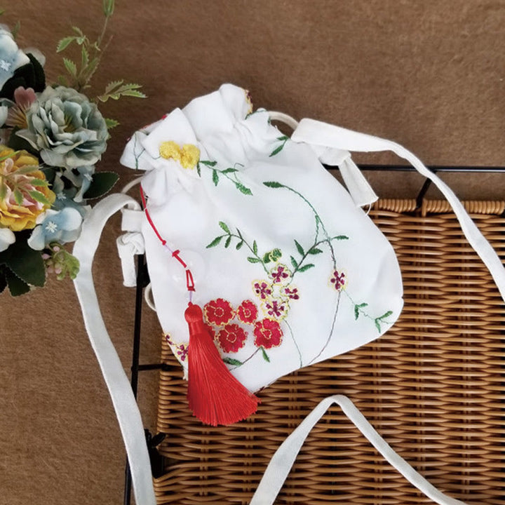 Bolso bandolera de lona con Buddha Stones , flores bordadas y flores de cerezo enredaderas.