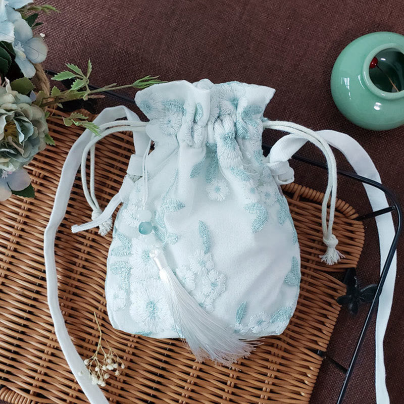 Bolso bandolera de lona con Buddha Stones , flores bordadas y flores de cerezo enredaderas.