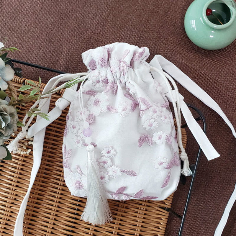 Bolso bandolera de lona con Buddha Stones , flores bordadas y flores de cerezo enredaderas.