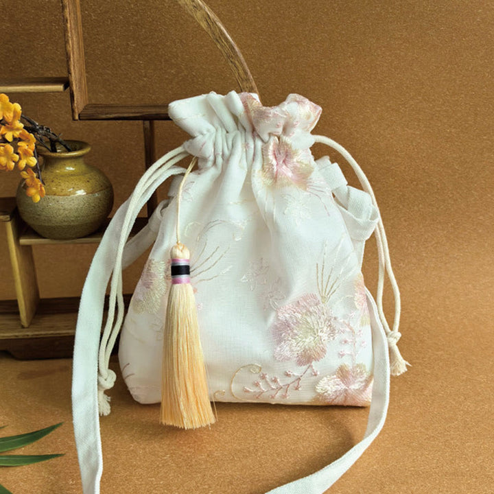 Bolso bandolera de lona con Buddha Stones , flores bordadas y flores de cerezo enredaderas.